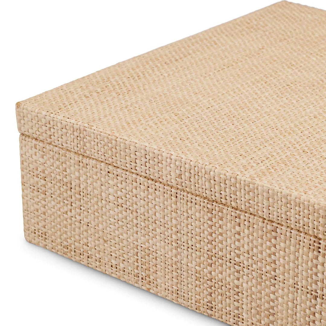 Beige woven storage box with a lid on a white background. Decorative Box Cady S by District Home
