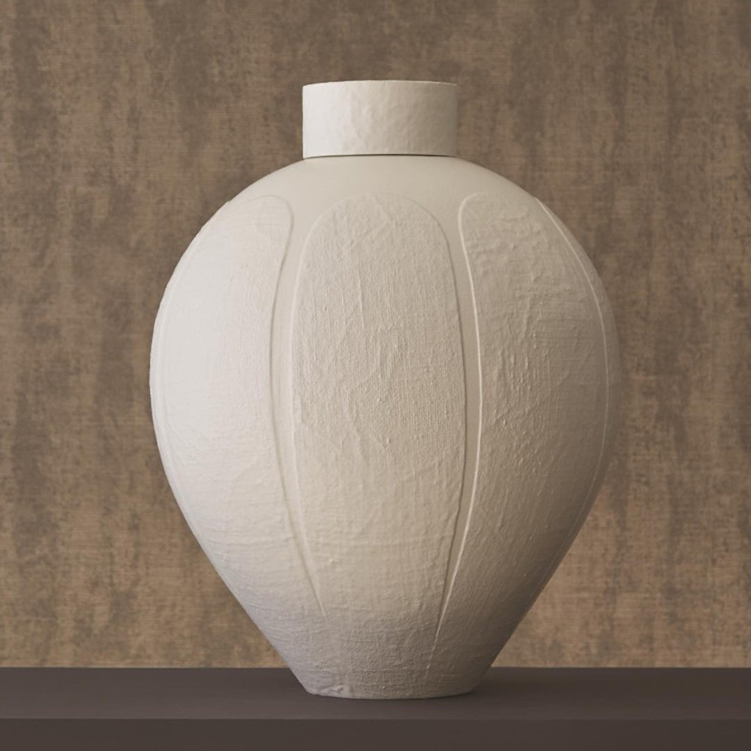 White textured vase on a white background. Decorative Jar Delphine District Home