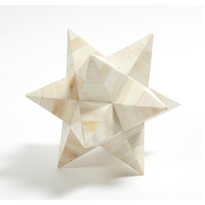 Geometric star-shaped object made of light-colored material on a white background Dodecahedron Sculpture Etoile District Home