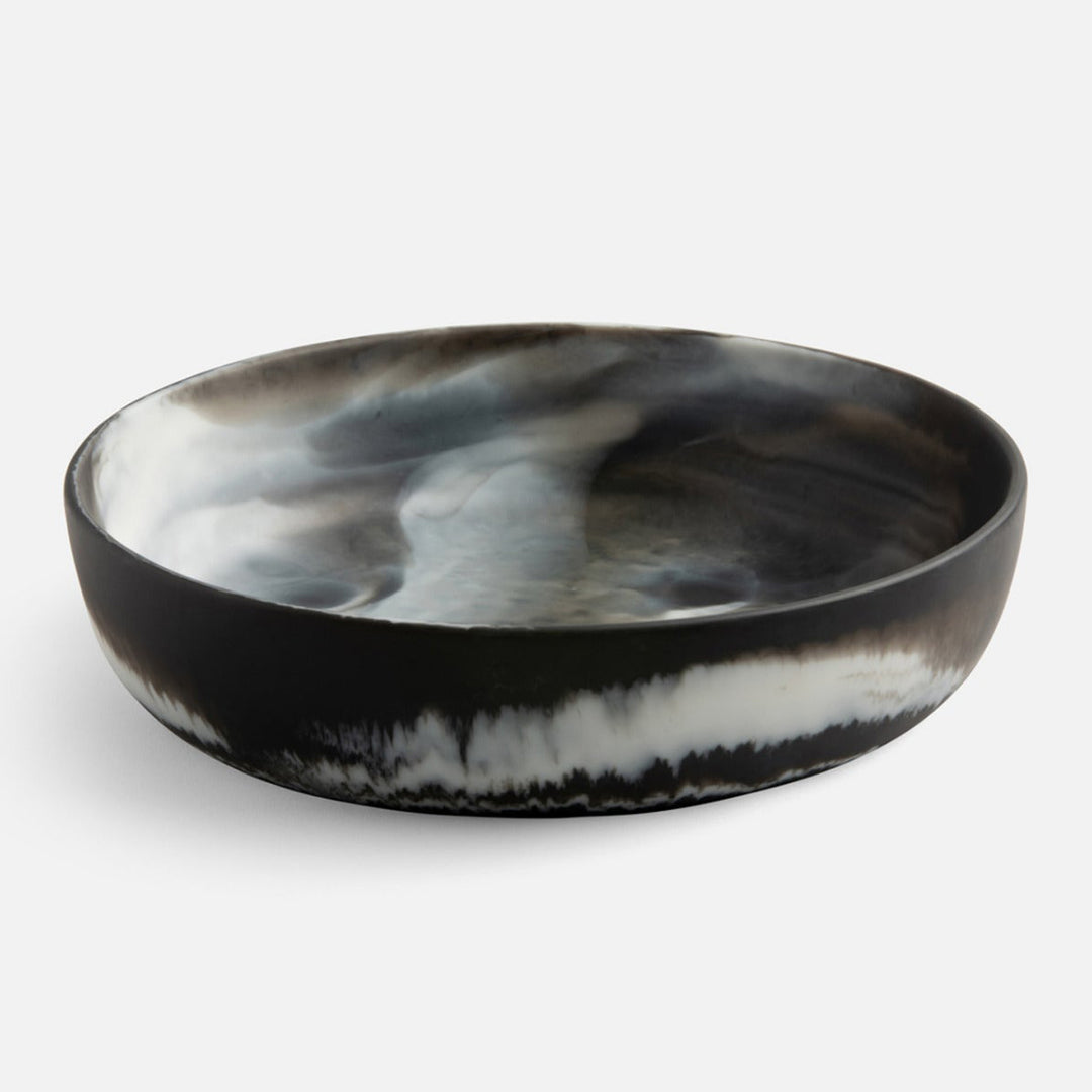 Black and white marbled ceramic bowl on a light gray background. Serving Bowl Hugo L by District Home