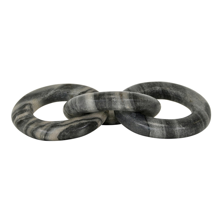 Three interlocking stone rings on a white background Decorative Sculpture Join District Home