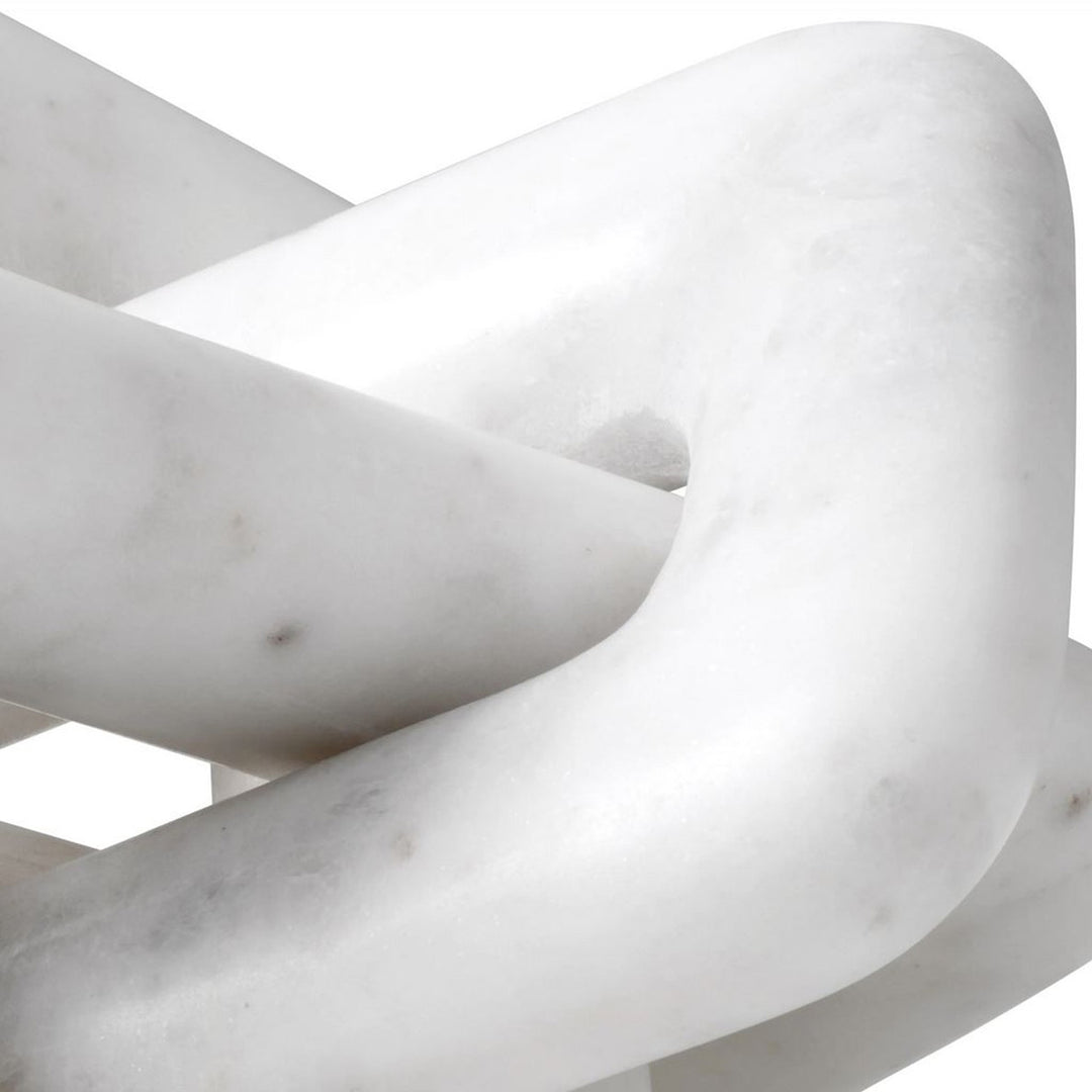 Marble knot sculpture on a white background. Decorative Sculpture Lock WH
