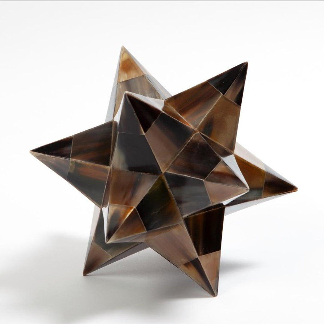 Geometric star-shaped object on a white background. Dodecahedron Sculpture Major by District Home
