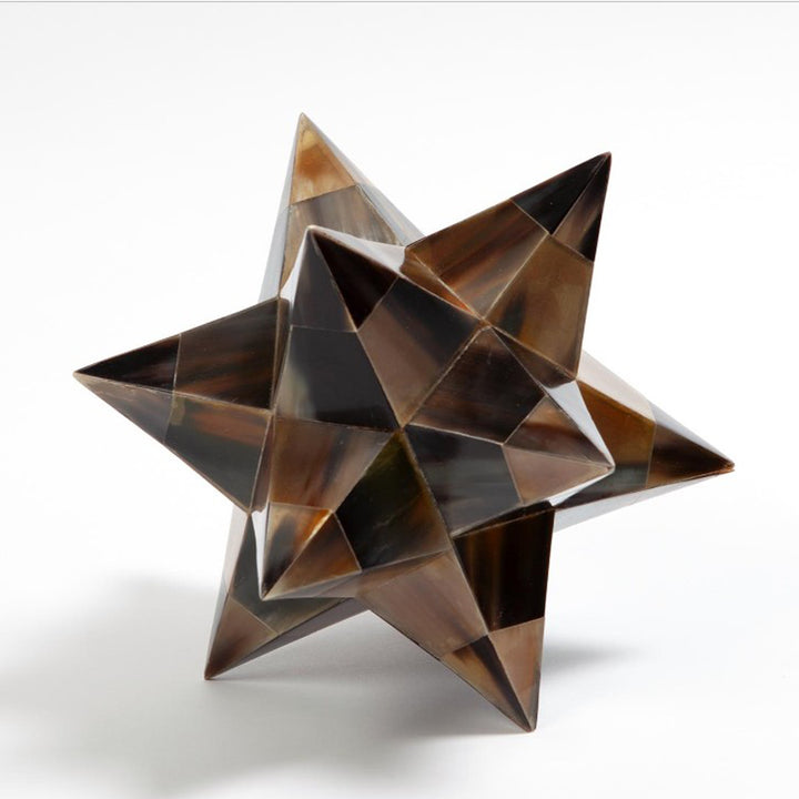 Geometric star-shaped object on a white background. Dodecahedron Sculpture Major by District Home