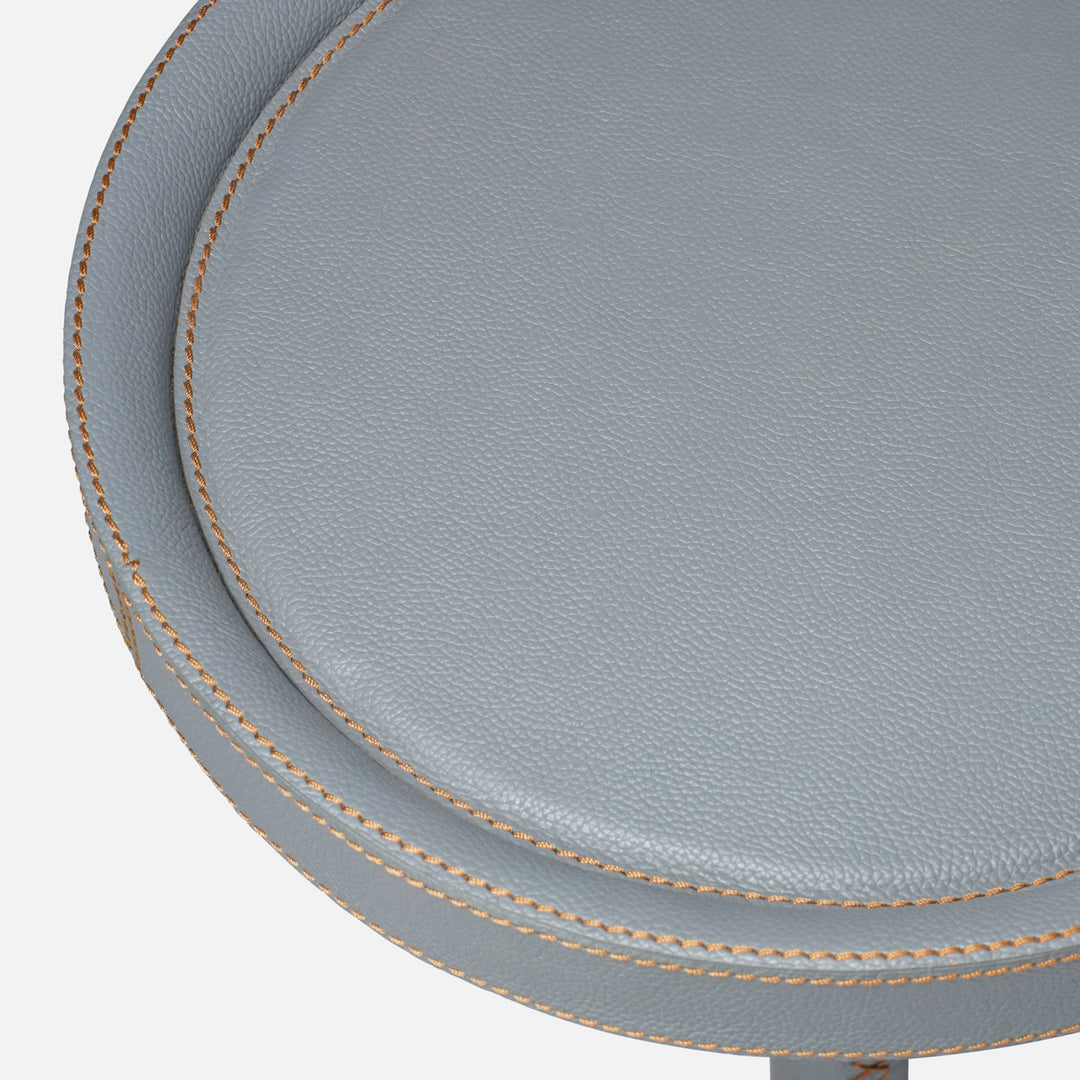 Small round side table with decorative trim on a white background. Accent Table Norm by District Home